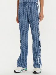 Lacoste Spodnie dresowe XF9313 Niebieski Regular Fit. Niebieskie spodnie dresowe Lacoste, bez wzorów, z bawełny. Za 739.99 zł.