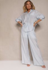 Jasnoniebieskie Spodnie Palazzo High Waist z Szeroką Nogawką i Gumką w Talii Jenarielis. Niebieskie jeansy Renee, bez wzorów, z jeansu, z podwyższonym stanem. W wyprzedaży za 56.99 zł.