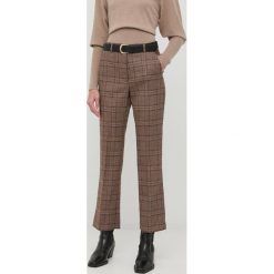 Weekend Max Mara spodnie wełniane damskie proste high waist. Spodnie materiałowe Weekend Max Mara, bez wzorów, z materiału, z podwyższonym stanem. Za 999.90 zł.