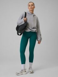 4F Legginsy treningowe bezszwowe damskie - turkusowe M/L. Niebieskie legginsy 4f, bez wzorów, z dzianiny, sportowe, długie. Za 119.99 zł.