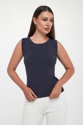 Top damski dzianinowy Valido MM. Topy MM, l, bez wzorów, z dzianiny, bez kołnierzyka, bez ramiączek. W wyprzedaży za 389.40 zł.
