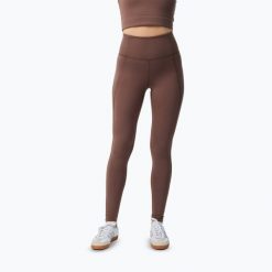 Legginsy Girlfriend Collective Compressive. Brązowe legginsy GIRLFRIEND COLLECTIVE, bez wzorów. Za 269.99 zł.