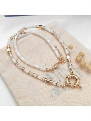 Atelier MIU Pozłacany naszyjnik z elementami ozdobnymi - dł. 42 cm rozmiar: onesize. Brązowe naszyjniki atelier MIU, z materiału, pozłacane. Za 76.95 zł.