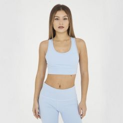 Crop top sportowy treningowy FEBE. Niebieskie biustonosze sportowe LEGEA, bez wzorów, z materiału, na fitness i siłownię. W wyprzedaży za 84.50 zł.