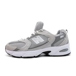 New Balance Sneakers Unisex Buty Lifestyle - Mtz Dorosłych. Szare buty do biegania New Balance, bez wzorów, z materiału, bez zapięcia, do biegania. Za 509.00 zł.