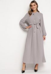 Ciemnoszara Rozkloszowana Sukienka Maxi z Plisowanym Dołem i Wiązanym Paskiem Nollira. Szare sukienki Born2be, bez wzorów, eleganckie, bez kołnierzyka, bez ramiączek, maxi, plisowane. W wyprzedaży za 110.49 zł.