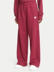 Calvin Klein Jeans Spodnie dresowe LV047C249G Czerwony ciemny Regular Fit. Czerwone spodnie dresowe Calvin Klein Jeans, bez wzorów, z bawełny. Za 369.99 zł.