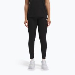 Legginsy damskie Reebok Identity Small Logo Cotton. Czarne bielizna termoaktywna damska Reebok, bez wzorów, bez ramiączek. Za 129.99 zł.