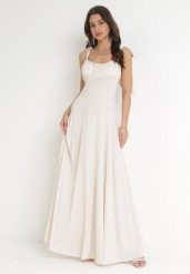 Beżowa Rozkloszowana Sukienka Maxi z Wiązanymi Ramiączkami Lisija. Brązowe sukienki Born2be, m, bez wzorów, eleganckie, bez kołnierzyka, bez ramiączek, maxi, rozkloszowane. W wyprzedaży za 118.99 zł.