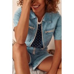 Kombinezon Damski 3D 1242 BS Jeans. Kombinezony blue shadow, bez wzorów, z gumy, bez kołnierzyka, bez ramiączek, krótkie. Za 259.90 zł.