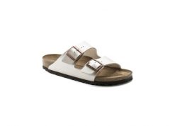 Klapki Birkenstock Arizona Birko Flor Damskie. Białe klapki Birkenstock, bez wzorów, ze skóry, eleganckie, bez obcasa, bez zapięcia. Za 541.35 zł.