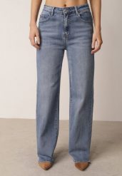 Niebieskie Bawełniane Jeansy z Wysokim Stanem i Szerokimi Nogawkami Marydia. Niebieskie jeansy Born2be, bez wzorów, z bawełny, eleganckie, z podwyższonym stanem. Za 109.99 zł.