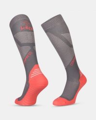 Unisex podkolanówki do biegania Kilpi COMPRESS-U. Czerwone skarpetki Kilpi, bez wzorów. Za 127.71 zł.