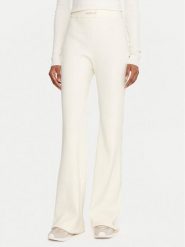 Guess Legginsy V5BB08 Z3JD2 Écru Flare Fit. Legginsy Guess, z aplikacjami, z syntetyku. Za 299.99 zł.