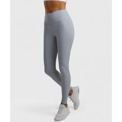 Legginsy sportowe damskie. Niebieskie legginsy NORDICDOTS, bez wzorów, z materiału, sportowe, długie. Za 365.00 zł.