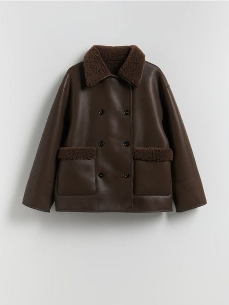 Dwustronna kurtka z imitacji skóry - ciemnobrązowy. Brązowe kurtki Reserved, l, bez wzorów, ze skóry, bez kaptura. Za 359.99 zł.