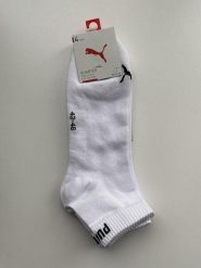 Skarpety unisex Puma QUARTER. Czarne skarpetki Puma, bez wzorów, z syntetyku. Za 66.99 zł.