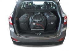 Torby Do Bagażnika Hyundai Ix35 2010-2013 4Szt Kjust. Czarne torby podróżne KJUST, bez wzorów, z kauczuku. Za 1,203.00 zł.