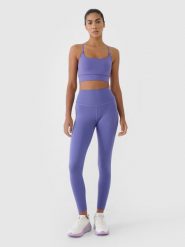 4F Legginsy treningowe z wysokim stanem damskie - granatowe XS. Niebieskie legginsy 4f, bez wzorów, z dzianiny, sportowe. W wyprzedaży za 99.99 zł.
