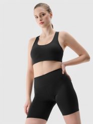 4F Legginsy kolarki treningowe z materiału z recyklingu damskie - czarne XS. Czarne legginsy 4f, bez wzorów, z dzianiny, sportowe. W wyprzedaży za 49.99 zł.