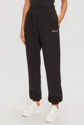 GUESS Czarne damskie spodnie dresowe Cecilia. Czarne spodnie dresowe Guess, z aplikacjami, z dresówki. W wyprzedaży za 309.99 zł.