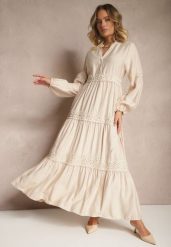 Beżowa Wiskozowa Sukienka o Rozkloszowanym Kroju z Koronką Gonalorin. Brązowe sukienki Renee, na co dzień, l, z aplikacjami, z koronki, eleganckie, bez kołnierzyka, bez ramiączek, maxi, rozkloszowane. W wyprzedaży za 127.99 zł.