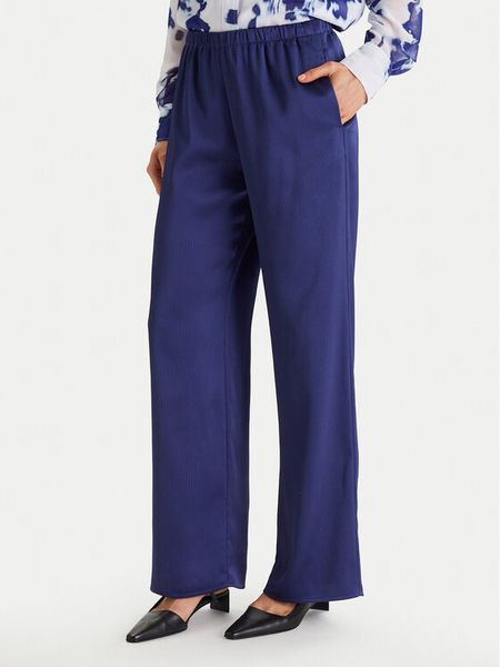 Calvin Klein Spodnie materiałowe LV044F611G Granatowy Regular Fit. Niebieskie spodnie materiałowe Calvin Klein, bez wzorów, z materiału. Za 316.99 zł.
