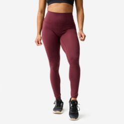 Legginsy fitness damskie Domyos. Fioletowe legginsy DOMYOS, bez wzorów, z elastanu, sportowe. Za 129.99 zł.