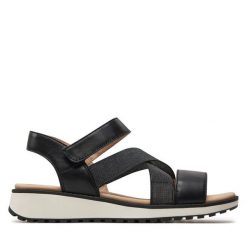 Sandały Caprice. Czarne sandały Caprice, bez wzorów, bez obcasa, na płaskiej podeszwie, bez zapięcia. Za 239.99 zł.