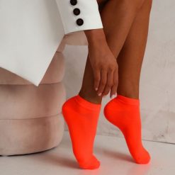 Bawełniane stopki GŁADKIE NEON POMARAŃCZ 824. Skarpetki Milena, bez wzorów, z bawełny. Za 13.90 zł.