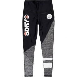 Legginsy sportowe damskie Superdry Sport Colour Block. Czarne legginsy sportowe Superdry, xs, bez wzorów, z gumy, z podwyższonym stanem. Za 112.49 zł.