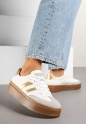 Biało-Złote Klasyczne Sneakersy Tenisówki na Niskiej Platformie Denirla. Białe trampki Renee, bez wzorów, z jeansu, eleganckie, bez zapięcia. W wyprzedaży za 67.99 zł.