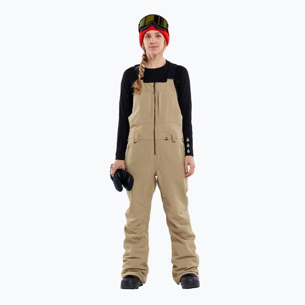 Spodnie snowboardowe damskie Volcom Swift Bib Overall. Zielone spodnie narciarskie Volcom, bez wzorów, snowboardowy. W wyprzedaży za 986.75 zł.