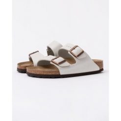 Klapki Birkenstock Arizona Birko Flor Damskie. Szare klapki Birkenstock, bez wzorów, z materiału, eleganckie, bez obcasa, bez zapięcia. Za 504.40 zł.