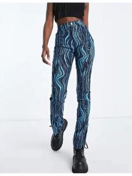 Monki Spodnie w kolorze granatowo-turkusowym rozmiar: 32. Niebieskie spodnie materiałowe Monki, bez wzorów, z materiału, z podwyższonym stanem. Za 43.99 zł.