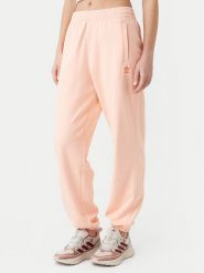Adidas Spodnie dresowe Essentials JD1525 Różowy Loose Fit. Czerwone spodnie dresowe adidas, bez wzorów, z bawełny. Za 159.99 zł.