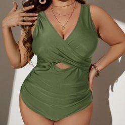 Jednoczęściowy strój kąpielowy z marszczeniem na plażę i basen Sumanda. Czarne stroje jednoczęściowe Intica, bez wzorów, z materiału. Za 169.00 zł.