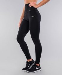 Klasyczne legginsy z wysokim stanem sportowe dla kobiet Carpatree. Czarne legginsy Carpatree, bez wzorów, z elastanu, klasyczne. Za 131.99 zł.
