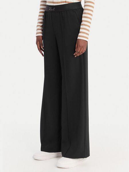 KARL LAGERFELD Spodnie materiałowe B1W10014 Czarny Relaxed Fit. Czarne spodnie materiałowe KARL LAGERFELD, bez wzorów, z materiału. Za 849.99 zł.