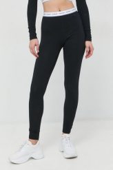 Guess legginsy damskie kolor czarny z aplikacją. Czarne legginsy Guess, z aplikacjami, z dzianiny. W wyprzedaży za 169.99 zł.