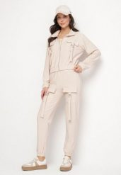 Jasnobeżowy Komplet Dresowy Bluza Rozpinana i Spodnie Slim w Stylu Utility Telavienna. Brązowe bluzy Born2be, m, bez wzorów, z dresówki, eleganckie, bez ramiączek, bez kaptura. Za 79.99 zł.