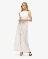 Superdry Haftowany kombinezon – OFF WHITE. Białe kombinezony Superdry, bez wzorów, z bawełny, boho, bez kołnierzyka, bez ramiączek. Za 346.50 zł.