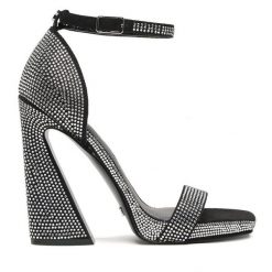 Sandały Guess. Czarne sandały Guess, z aplikacjami, bez obcasa, na słupku, bez zapięcia. Za 569.99 zł.