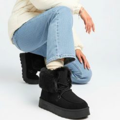 Śniegowce damskie Big Star, na wysokiej platformie z futerkiem i okrągłym noskiem, czarne, SS274113. Czarne śniegowce BIG STAR, bez wzorów, bez zapięcia. Za 135.99 zł.