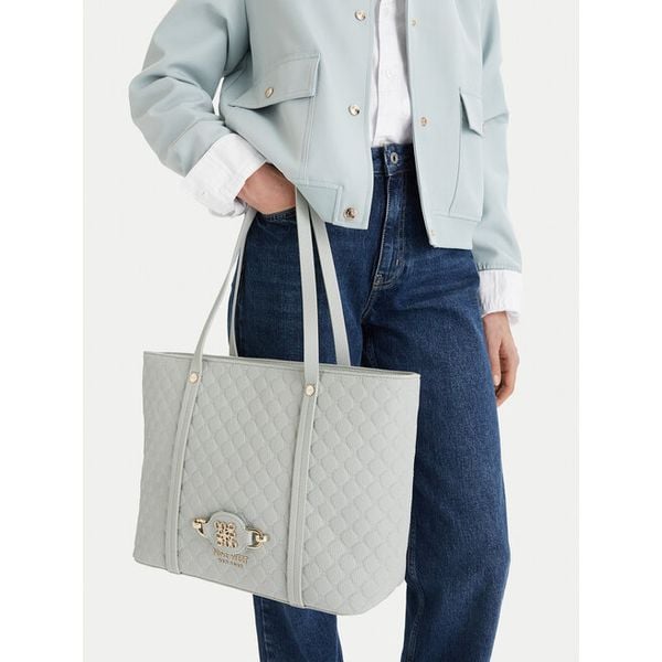 Torebka Nine West. Niebieskie shopper bag Nine West, bez wzorów, bez dodatków. Za 165.99 zł.