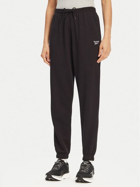 Reebok Spodnie dresowe 100071691 Czarny Regular Fit. Czarne spodnie dresowe Reebok, bez wzorów, z bawełny. Za 129.99 zł.