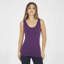 Top treningowy damski RAITA fioletowy. Fioletowe topy LEGEA, bez wzorów, z materiału, sportowe, bez kołnierzyka, bez ramiączek. Za 39.00 zł.