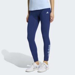 Legginsy fitness damskie ADIDAS. Niebieskie legginsy adidas, bez wzorów, z materiału, sportowe. Za 129.99 zł.