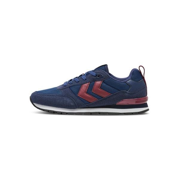 Sneakersy Hummel Monaco 86. Niebieskie buty sportowe lifestyle Hummel, bez wzorów, sportowe, bez zapięcia. W wyprzedaży za 216.50 zł.