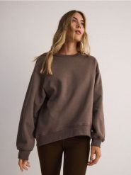 Bluza oversize - brązowy. Brązowe bluzy Reserved, l, bez wzorów, z bawełny, bez ramiączek, bez kaptura. W wyprzedaży za 49.99 zł.